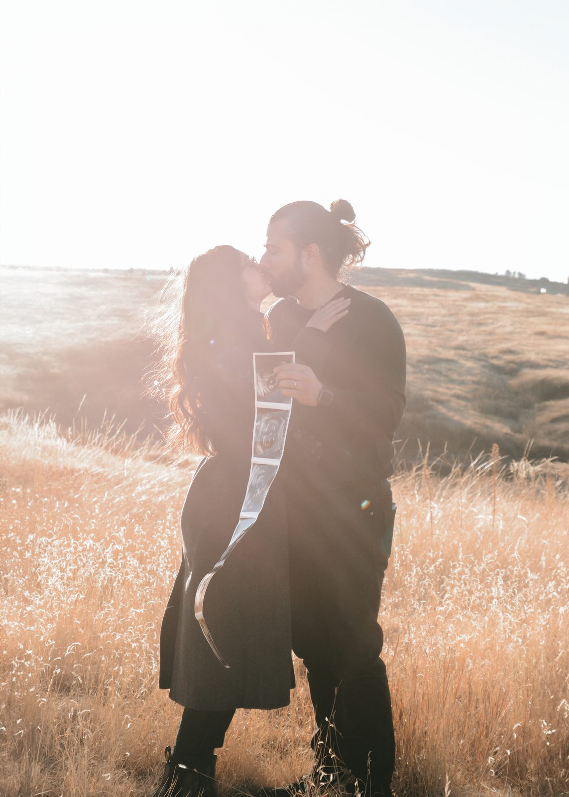 Couple in golden backlight