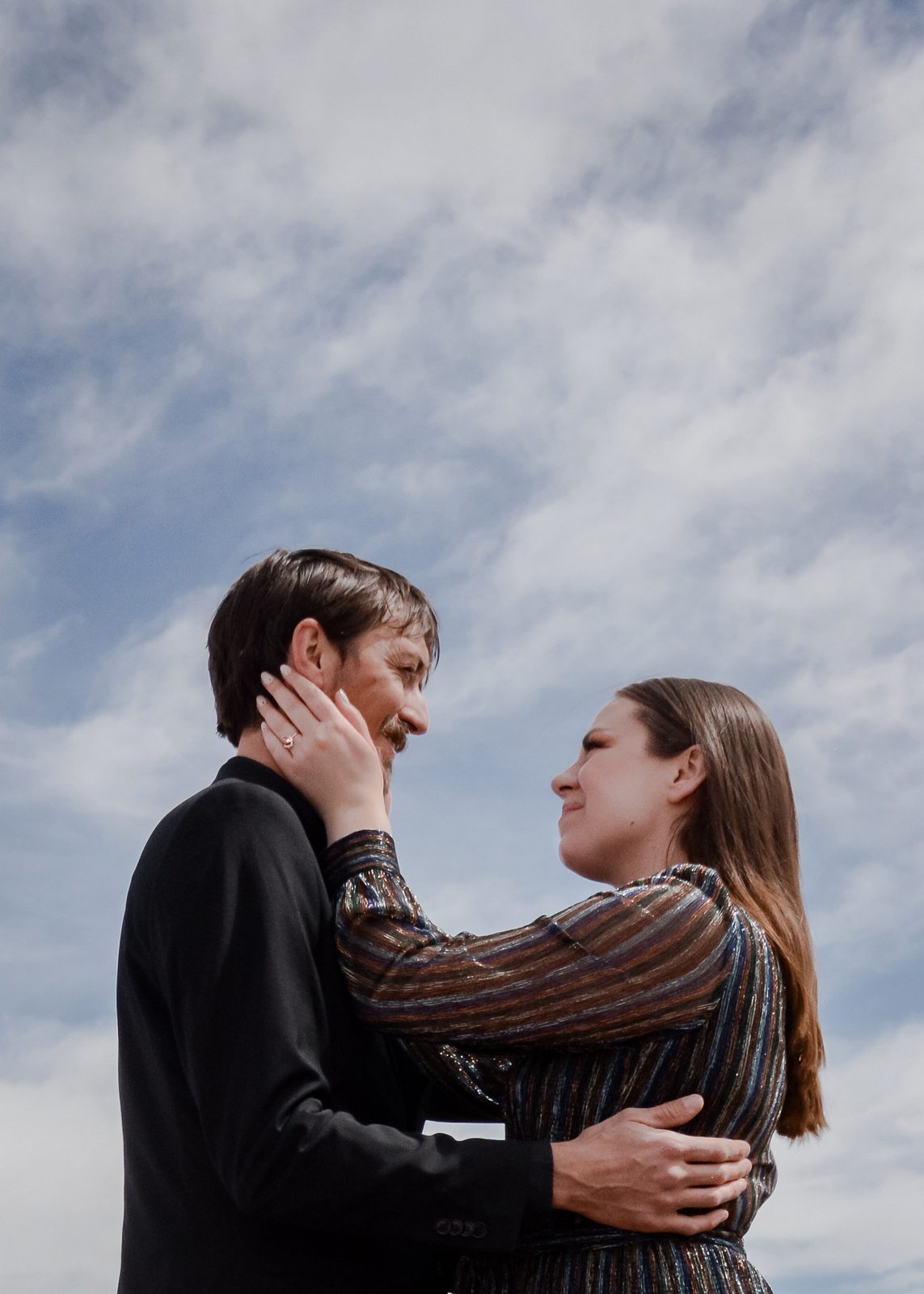 Couple against the sky