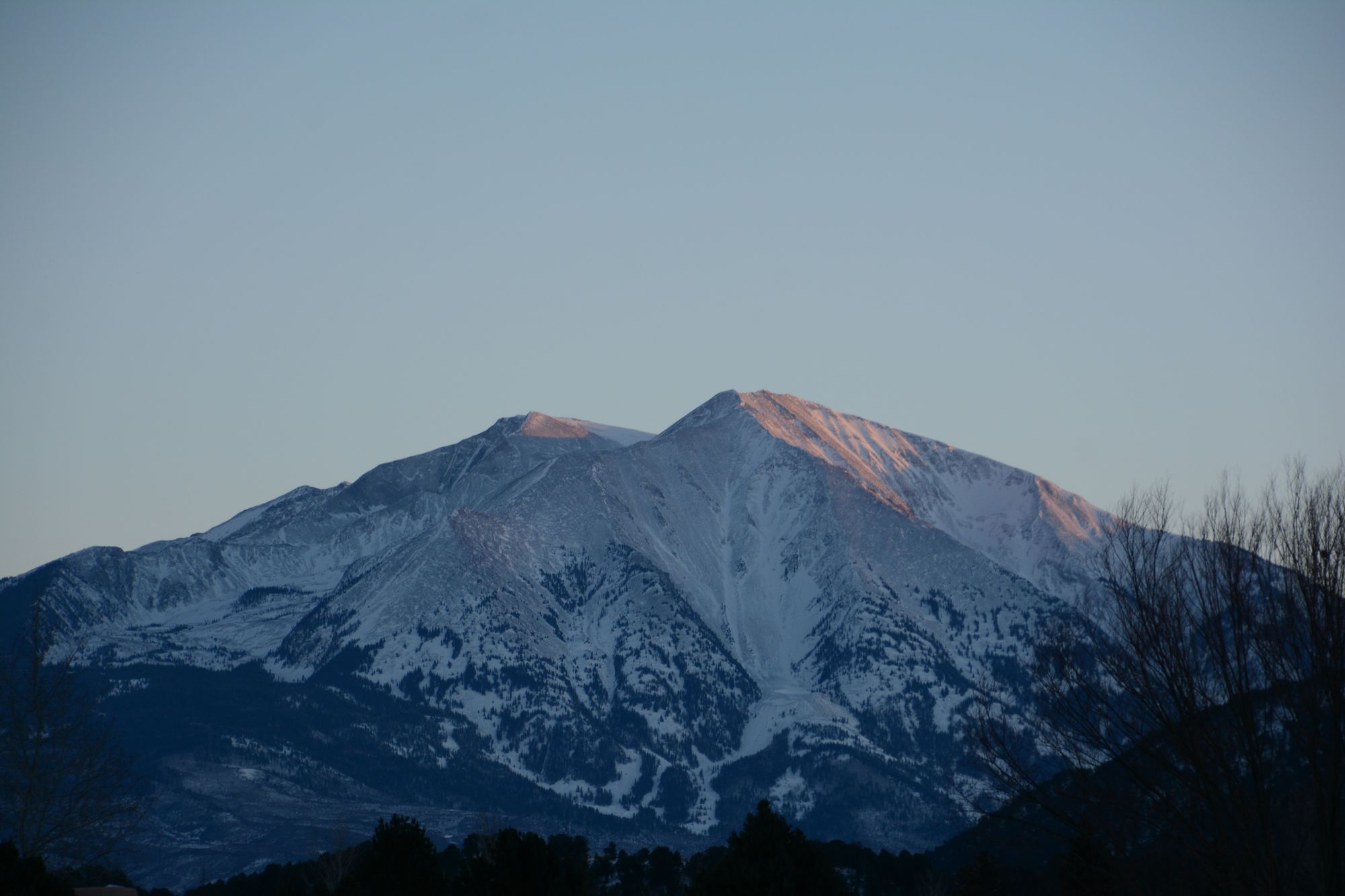 Alpenglow on a snowy peak